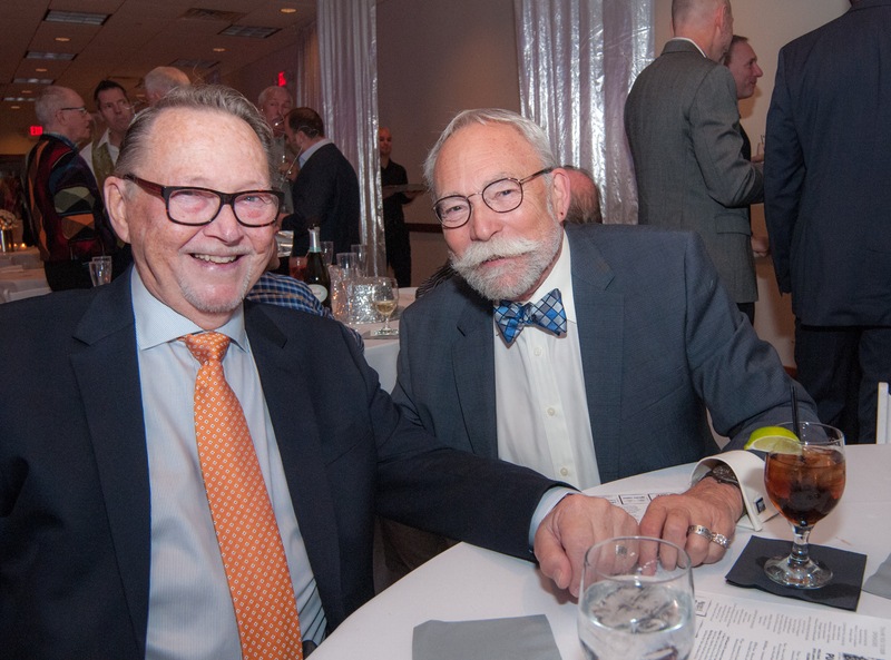 Dapper gents Ray Michener, left, and Tom Carlson prepare for an entertaining evening. BY DENY HOWETH
